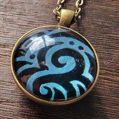 Double Sided Shimmer Swirl Pendant